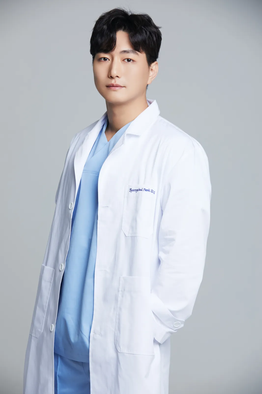 Dr. Byungchul Park in a white clinical coat
