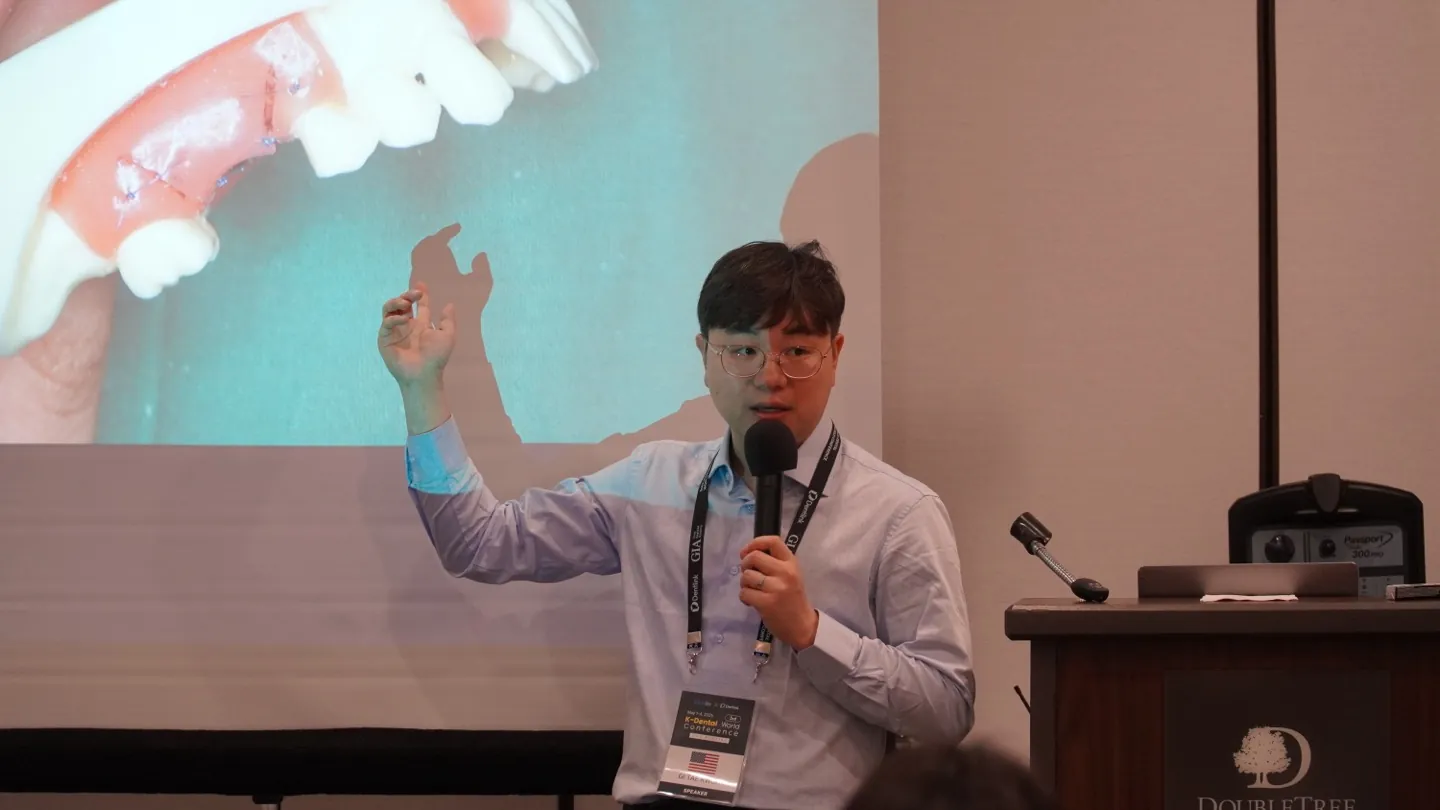 Dr. Kwon speaking at a dental conference