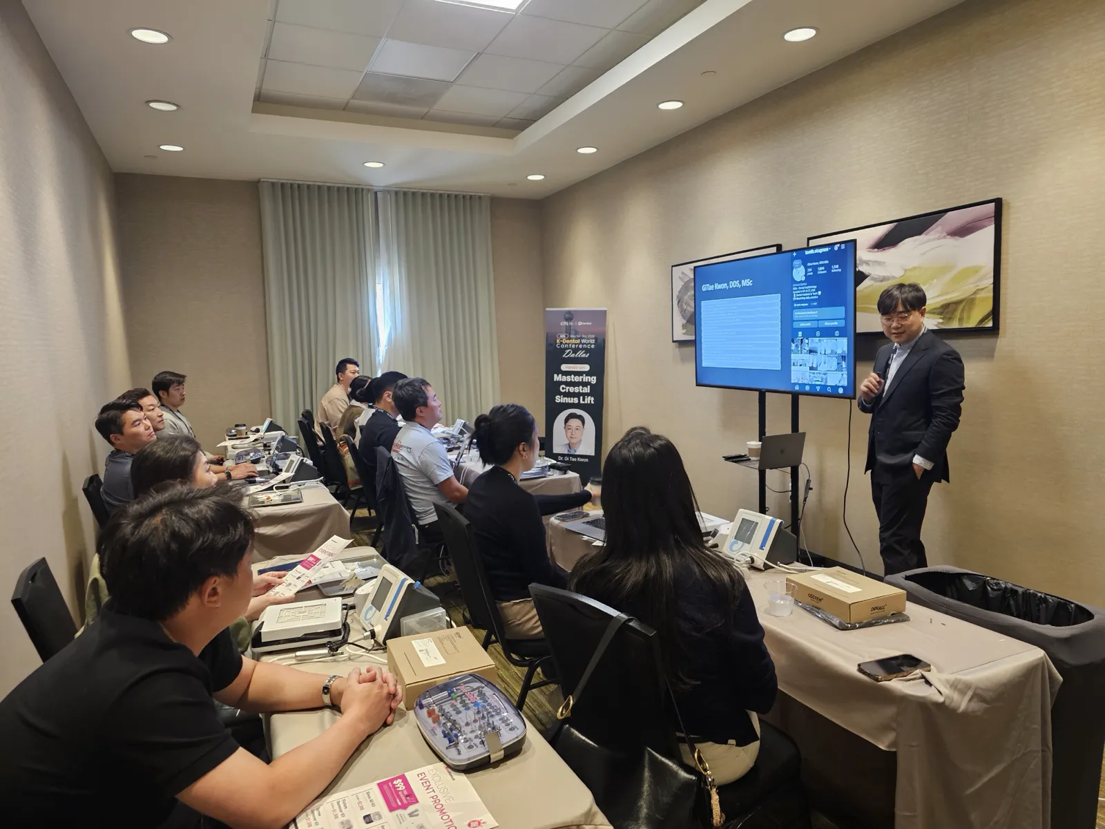 Dr. Kwon lecturing to a room of dentists in Dallas, Texas