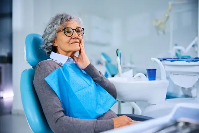 a clear smile dental studio with a dental chair