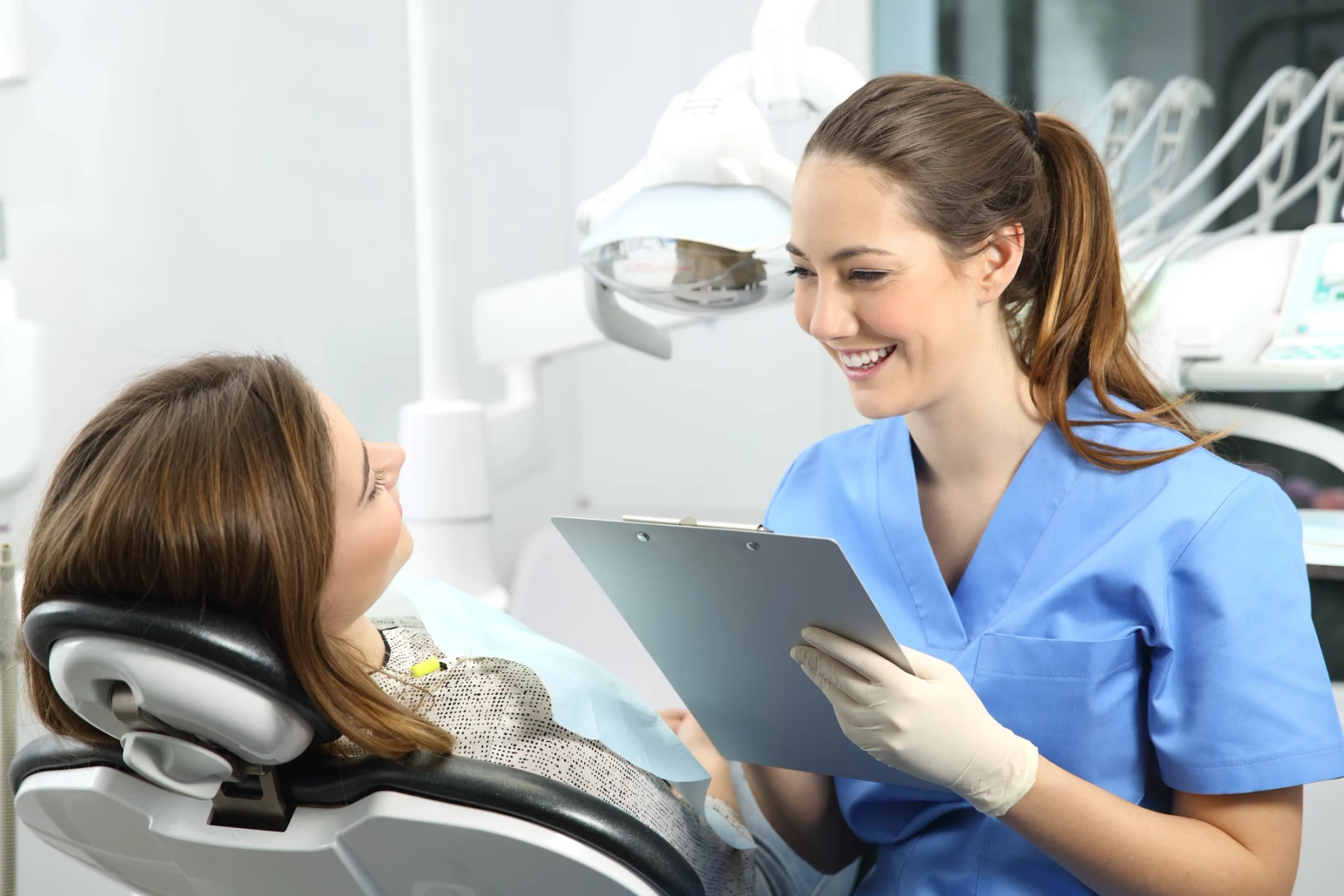 Dentist having a calm conversation with a patient