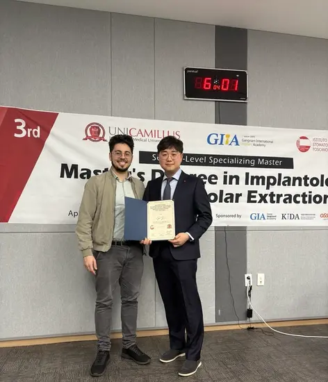 two men standing in front of a sign that says 3rd